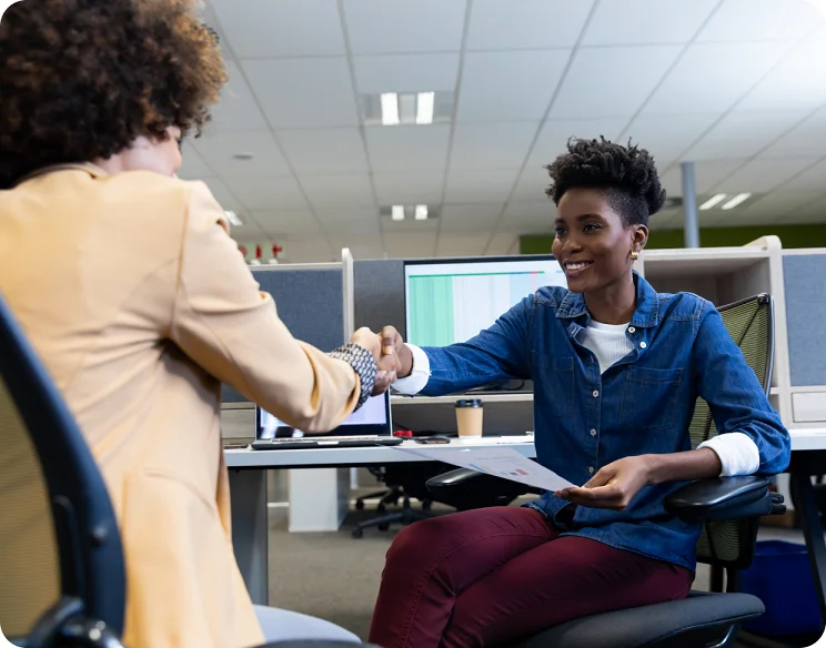 Recruiter shaking hands with candidate
